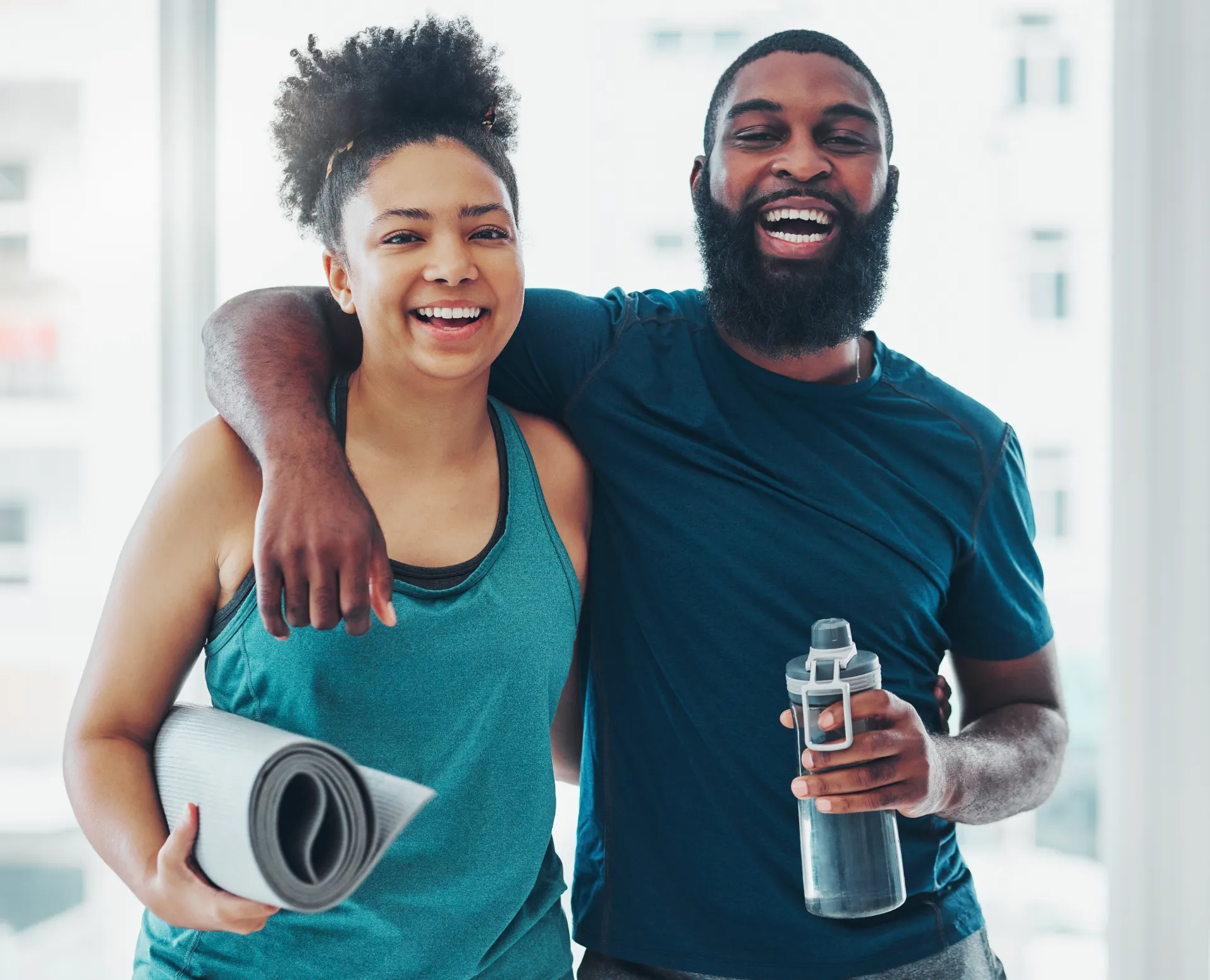portrait yoga and a couple of friends in a gym fo utc